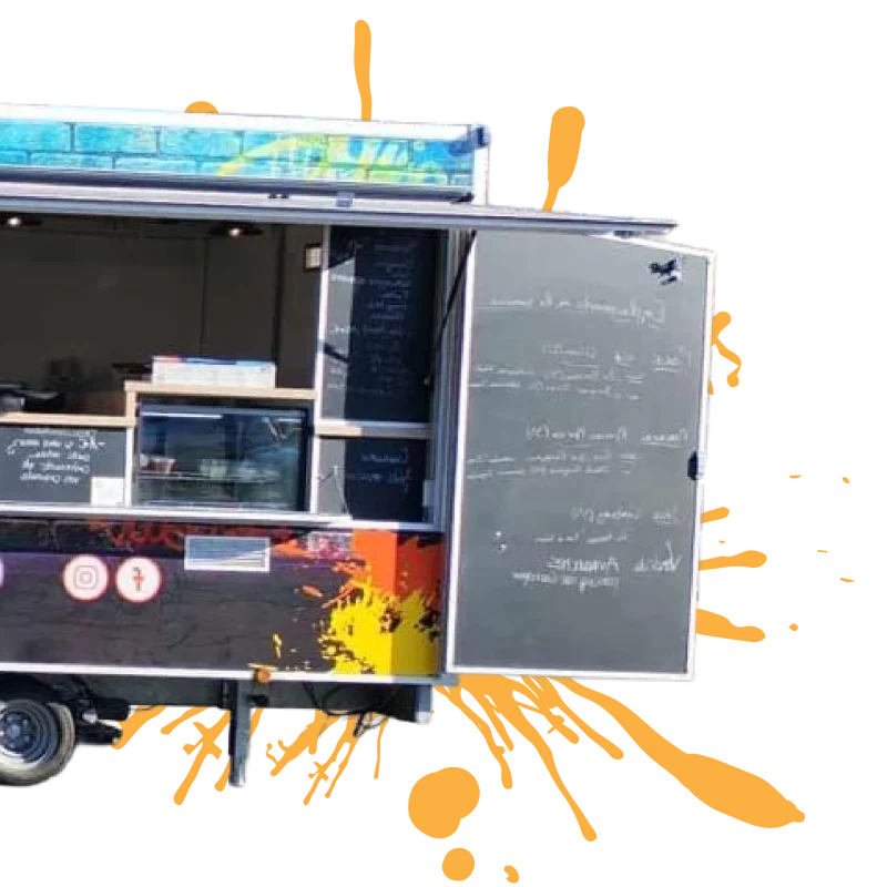 Camion food truck avec tache de peinture derriere